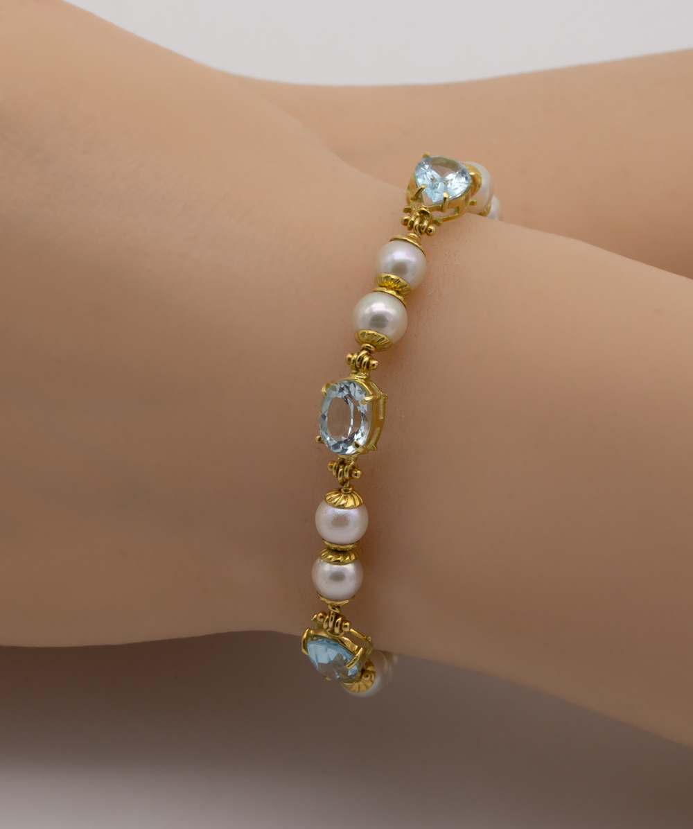  Perlenarmband mit Blau-Topas 750er Gelbgold 