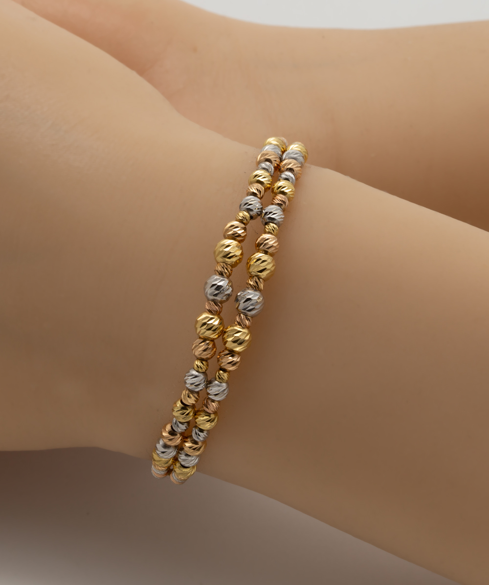 Armspange mit Kugeln 750er Gold tricolor