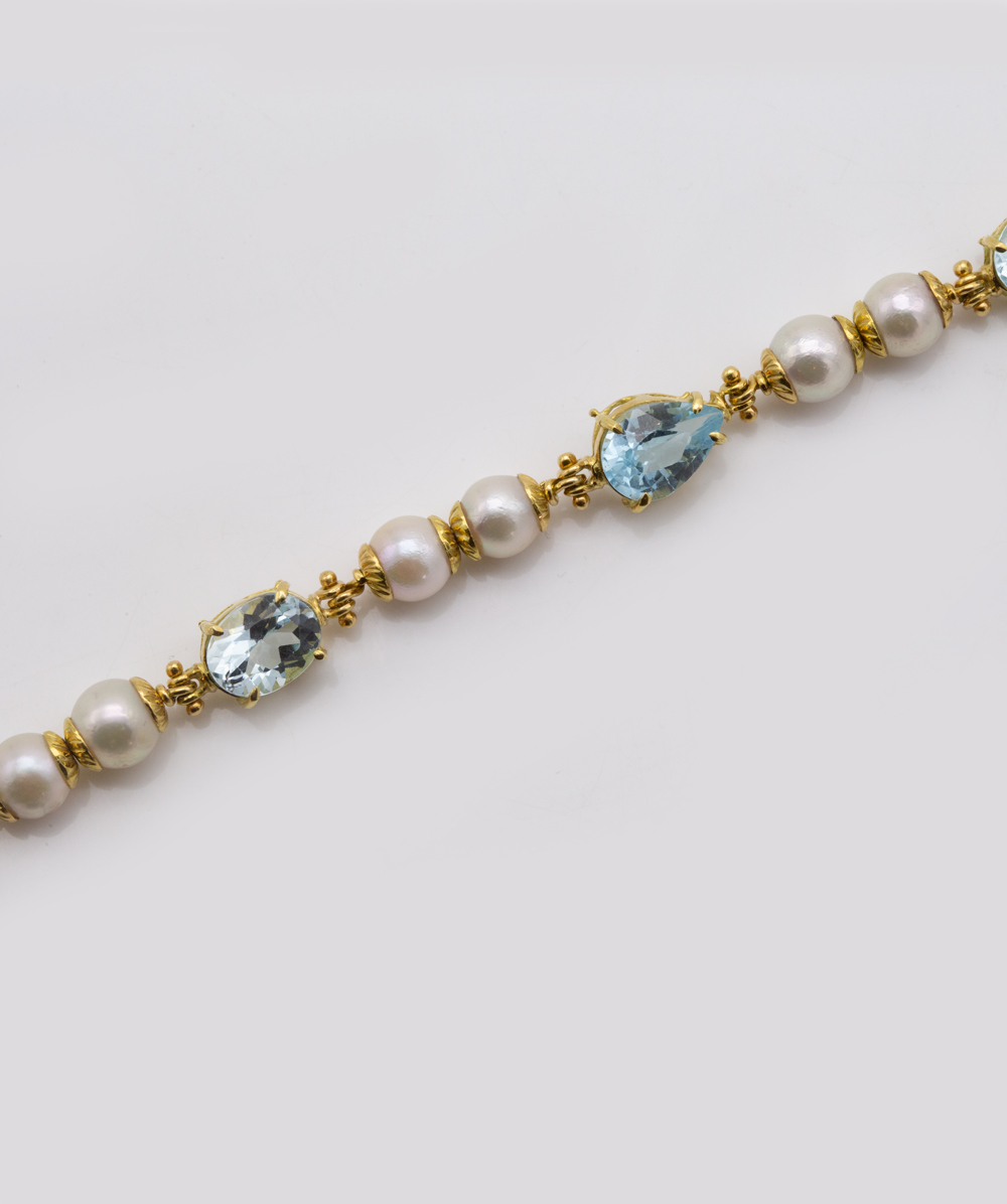  Perlenarmband mit Blau-Topas 750er Gelbgold 