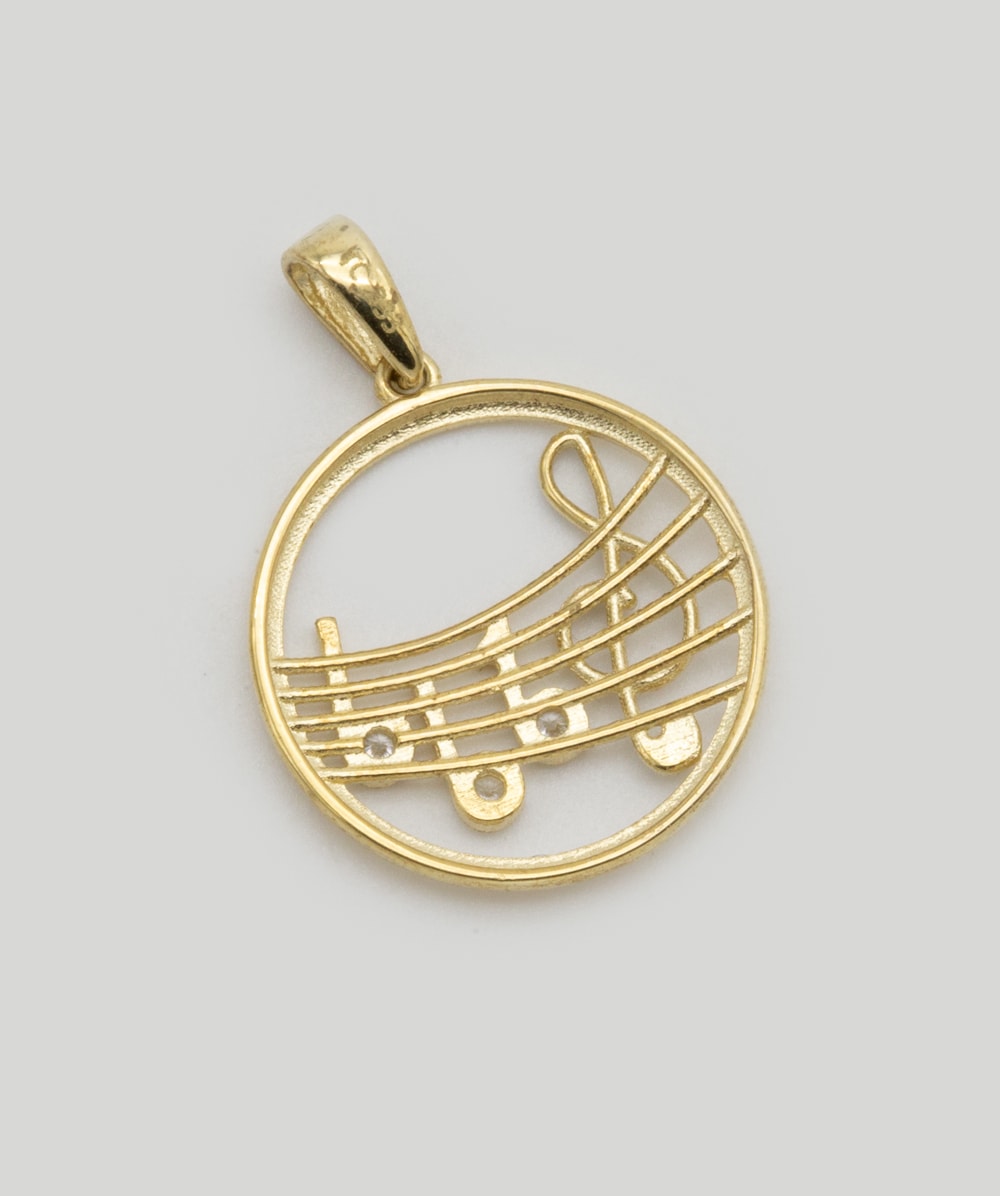 Anhänger Notenschlüssel mit Zirkonia 333er Gold bicolor